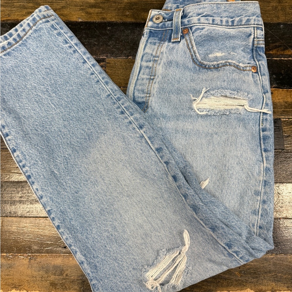 Levi's Light Blue Straight Leg Jeans with Distressed Detail